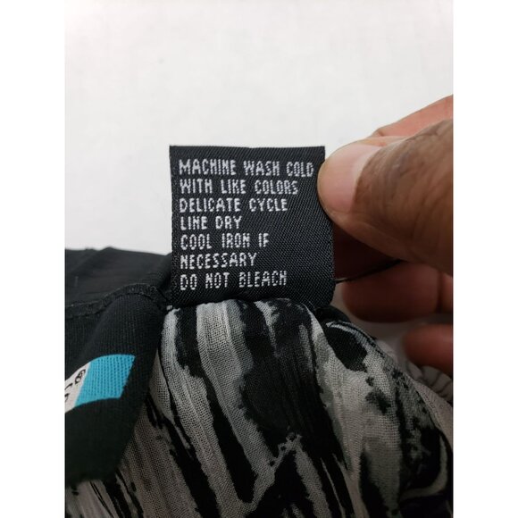 Requirements black and light gray floral, zebra lined, modest skirt, size 10 - Picture 8 of 8